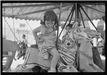 Little Girl on Merry Go Round at Taos Fiestas
