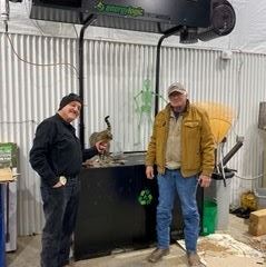 OILS Edward, Feather, Lorenzo by the oil burning heater